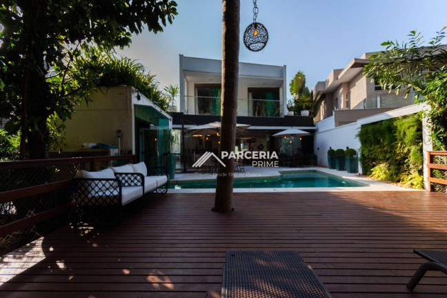 Imagem Casa com 6 Quartos à Venda, 450 m² em Riviera Módulo 21 - Bertioga Imagem Casa com 6 Quartos à Venda, 450 m² em Riviera Módulo 21 - Bertioga