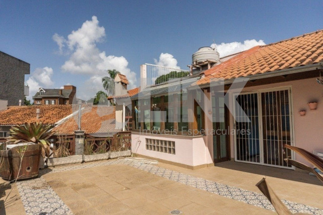 Imagem Casa com 5 Quartos à Venda, 297 m² em Chácara Das Pedras - Porto Alegre Imagem Casa com 5 Quartos à Venda, 297 m² em Chácara Das Pedras - Porto Alegre