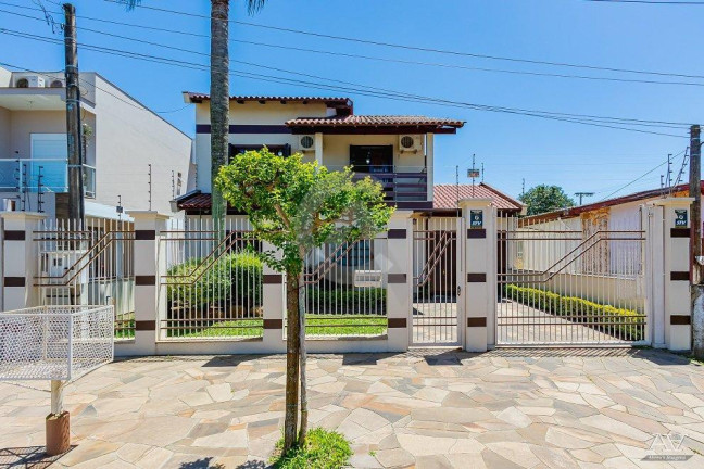 Imagem Casa com 4 Quartos à Venda, 210 m² em Niterói - Canoas Imagem Casa com 4 Quartos à Venda, 210 m² em Niterói - Canoas