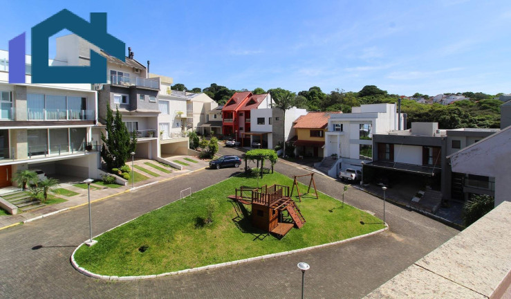Imagem Sobrado com 3 Quartos à Venda, 224 m² em Vila Nova - Porto Alegre
