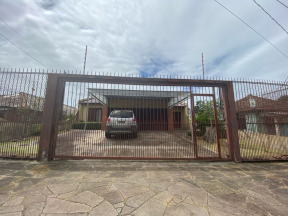 Imagem Casa com 3 Quartos à Venda, 293 m² em Jardim Do Salso - Porto Alegre Imagem Casa com 3 Quartos à Venda, 293 m² em Jardim Do Salso - Porto Alegre