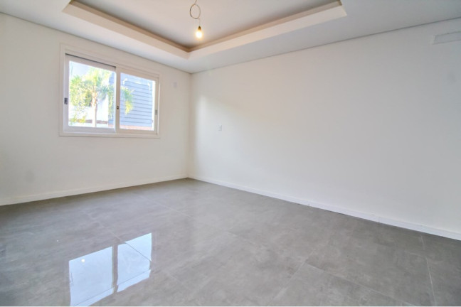 Imagem Casa com 3 Quartos à Venda, 197 m² em Vila Nova - Porto Alegre