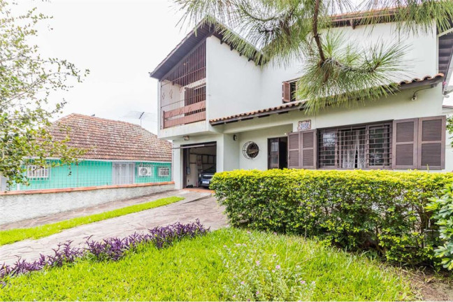Imagem Casa com 4 Quartos à Venda, 313 m² em Cavalhada - Porto Alegre Imagem Casa com 4 Quartos à Venda, 313 m² em Cavalhada - Porto Alegre