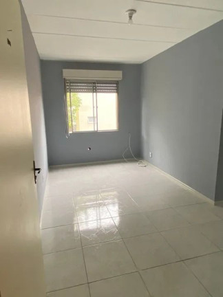 Imagem Imóvel com 1 Quarto à Venda, 41 m² em Vila Nova - Porto Alegre Imagem Imóvel com 1 Quarto à Venda, 41 m² em Vila Nova - Porto Alegre