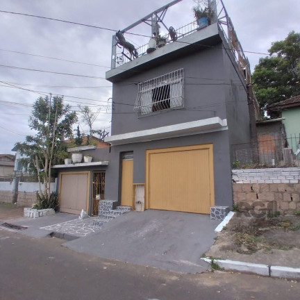 Imagem Casa com 8 Quartos à Venda, 300 m² em Cavalhada - Porto Alegre Imagem Casa com 8 Quartos à Venda, 300 m² em Cavalhada - Porto Alegre