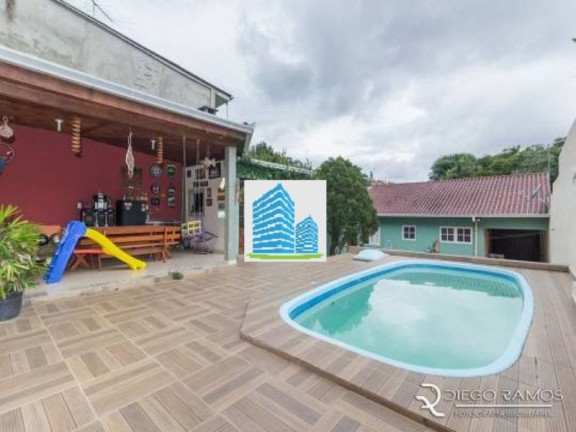 Imagem Casa com 2 Quartos à Venda, 75 m² em Parque Santa Fé - Porto Alegre Imagem Casa com 2 Quartos à Venda, 75 m² em Parque Santa Fé - Porto Alegre