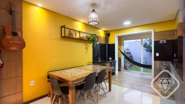 Imagem Casa com 3 Quartos à Venda, 153 m² em Jardins Do Prado - Porto Alegre Imagem Casa com 3 Quartos à Venda, 153 m² em Jardins Do Prado - Porto Alegre