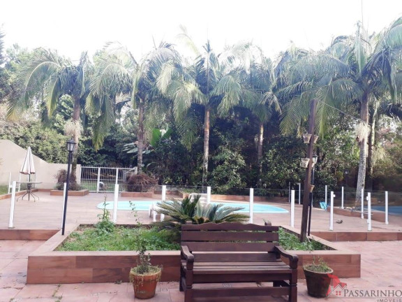 Imagem Casa com 4 Quartos à Venda, 317 m² em Centenário - Torres