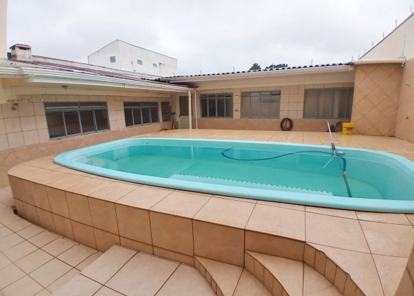 Imagem Sobrado com 9 Quartos à Venda, 456 m² em Cajuru - Curitiba