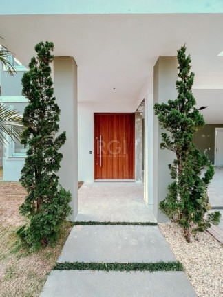 Imagem Imóvel com 4 Quartos à Venda, em Vila Nova - Porto Alegre Imagem Imóvel com 4 Quartos à Venda, em Vila Nova - Porto Alegre