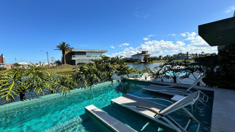 Imagem Casa com 4 Quartos à Venda, 184 m² em Condominio Riviera Xangri-la - Xangri-lá Imagem Casa com 4 Quartos à Venda, 184 m² em Condominio Riviera Xangri-la - Xangri-lá