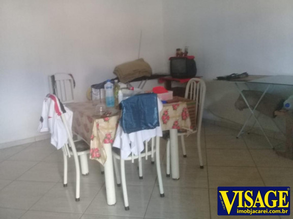 Imagem Casa com 2 Quartos à Venda, 250 m² em Caraguatatuba Imagem Casa com 2 Quartos à Venda, 250 m² em Caraguatatuba