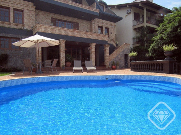 Imagem Casa de Condomínio com 4 Quartos à Venda, 550 m² em Cavalhada - Porto Alegre Imagem Casa de Condomínio com 4 Quartos à Venda, 550 m² em Cavalhada - Porto Alegre