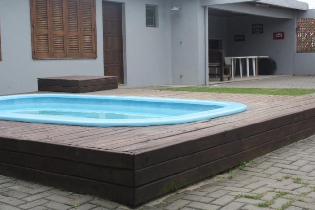 Imagem Casa com 4 Quartos à Venda, 188 m² em Centro - Xangri-la Imagem Casa com 4 Quartos à Venda, 188 m² em Centro - Xangri-la