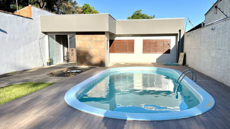 Imagem Casa com 3 Quartos à Venda, 106 m² em Niterói - Canoas Imagem Casa com 3 Quartos à Venda, 106 m² em Niterói - Canoas