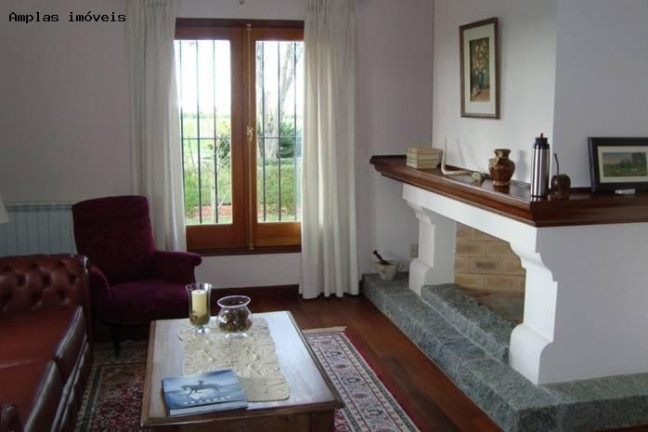 Imagem Imóvel com 4 Quartos à Venda, 1.000 m²