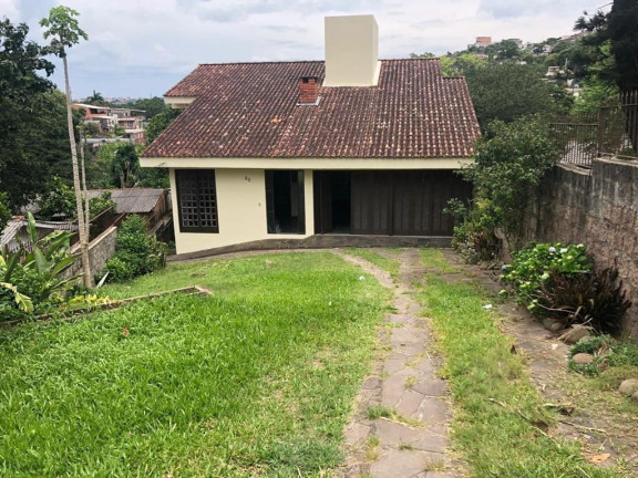 Imagem Casa com 4 Quartos à Venda, 242 m² em Cascata - Porto Alegre Imagem Casa com 4 Quartos à Venda, 242 m² em Cascata - Porto Alegre