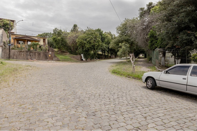 Imagem Casa com 4 Quartos à Venda, 170 m² em Vila Nova - Porto Alegre Imagem Casa com 4 Quartos à Venda, 170 m² em Vila Nova - Porto Alegre