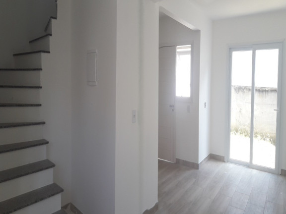 Imagem Casa com 3 Quartos à Venda, 75 m² em Vila Nova - Porto Alegre Imagem Casa com 3 Quartos à Venda, 75 m² em Vila Nova - Porto Alegre
