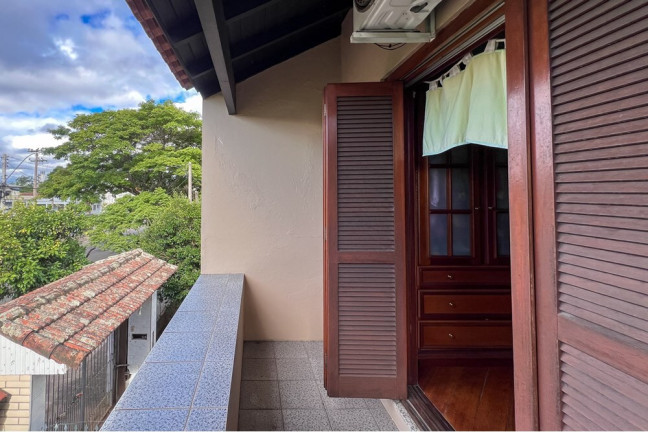 Imagem Casa com 3 Quartos à Venda, 211 m² em Niterói - Canoas Imagem Casa com 3 Quartos à Venda, 211 m² em Niterói - Canoas