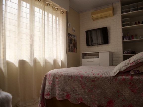 Imagem Casa com 4 Quartos à Venda, 90 m² em Parque Santa Fé - Porto Alegre Imagem Casa com 4 Quartos à Venda, 90 m² em Parque Santa Fé - Porto Alegre
