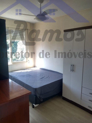 Imagem Imóvel com 2 Quartos à Venda, 56 m² em Cavalhada - Porto Alegre Imagem Imóvel com 2 Quartos à Venda, 56 m² em Cavalhada - Porto Alegre