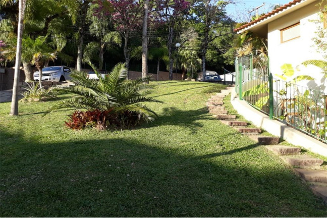 Imagem Casa com 4 Quartos à Venda,  em Teresópolis - Porto Alegre