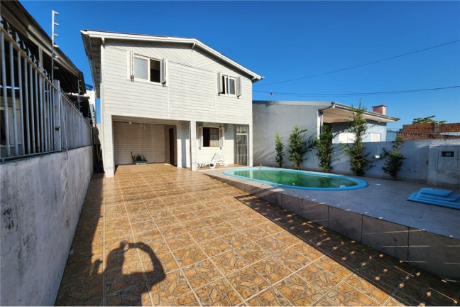 Imagem Casa com 3 Quartos à Venda, em Olaria - Canoas Imagem Casa com 3 Quartos à Venda, em Olaria - Canoas