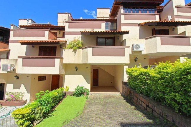Imagem Casa com 3 Quartos à Venda, 167 m² em Tristeza - Porto Alegre Imagem Casa com 3 Quartos à Venda, 167 m² em Tristeza - Porto Alegre