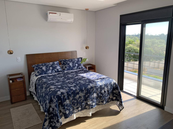 Imagem Casa de Condomínio com 3 Quartos à Venda, 328 m²