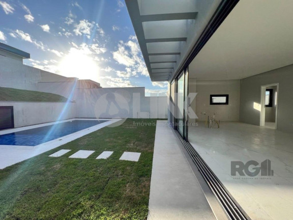 Imagem Imóvel com 4 Quartos à Venda, 371 m² em Vila Nova - Porto Alegre Imagem Imóvel com 4 Quartos à Venda, 371 m² em Vila Nova - Porto Alegre