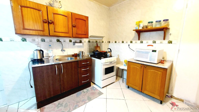Imagem Casa com 6 Quartos à Venda, 220 m² em Getúlio Vargas - Torres Imagem Casa com 6 Quartos à Venda, 220 m² em Getúlio Vargas - Torres