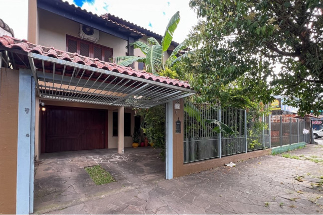Imagem Casa com 3 Quartos à Venda, 211 m² em Niterói - Canoas Imagem Casa com 3 Quartos à Venda, 211 m² em Niterói - Canoas
