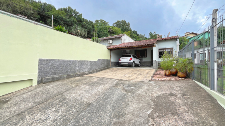 Imagem Casa com 3 Quartos à Venda, 156 m² em Vila Nova - Porto Alegre Imagem Casa com 3 Quartos à Venda, 156 m² em Vila Nova - Porto Alegre