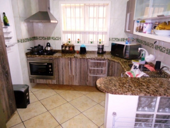 Imagem Casa com 3 Quartos à Venda, 199 m² em Jardim Itu - Porto Alegre