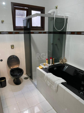 Imagem Casa com 4 Quartos à Venda, 480 m² em Santo Antônio - Porto Alegre