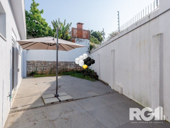 Imagem Casa com 3 Quartos à Venda, 400 m² em Três Figueiras - Porto Alegre Imagem Casa com 3 Quartos à Venda, 400 m² em Três Figueiras - Porto Alegre