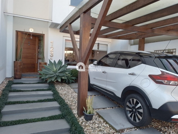 Imagem Casa com 3 Quartos à Venda, 180 m²