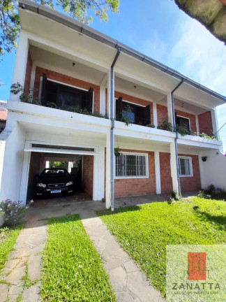 Imagem Casa com 6 Quartos à Venda, 276 m² em Centro - Esteio Imagem Casa com 6 Quartos à Venda, 276 m² em Centro - Esteio