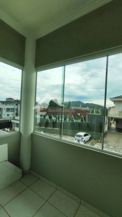 Imagem Casa de Condomínio com 4 Quartos à Venda, 215 m² em Iririú - Joinville