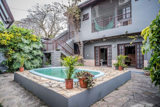 Imagem Imóvel com 4 Quartos à Venda,  em Sarandi - Porto Alegre