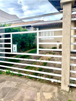 Imagem Casa com 2 Quartos à Venda, 130 m² em Igara - Canoas Imagem Casa com 2 Quartos à Venda, 130 m² em Igara - Canoas