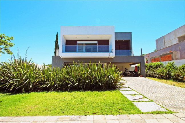 Imagem Casa com 4 Quartos à Venda, em Vila Nova - Porto Alegre Imagem Casa com 4 Quartos à Venda, em Vila Nova - Porto Alegre