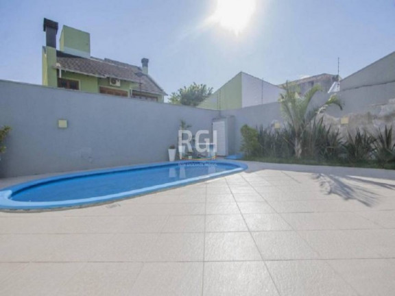 Imagem Casa com 4 Quartos à Venda, 369 m² em Sarandi - Porto Alegre Imagem Casa com 4 Quartos à Venda, 369 m² em Sarandi - Porto Alegre