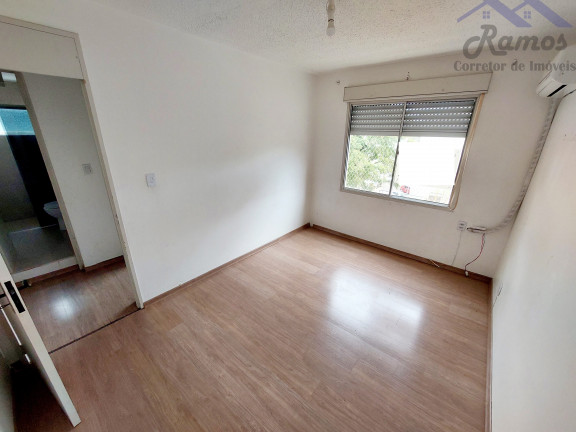 Imagem Imóvel com 2 Quartos à Venda, 50 m² em Vila Nova - Porto Alegre Imagem Imóvel com 2 Quartos à Venda, 50 m² em Vila Nova - Porto Alegre