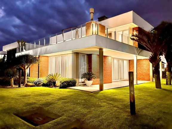 Imagem Casa de Condomínio com 4 Quartos à Venda, em Xangri-lá Imagem Casa de Condomínio com 4 Quartos à Venda, em Xangri-lá
