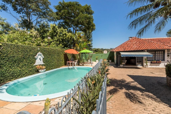 Imagem Imóvel com 4 Quartos à Venda, em Jardim Sabará - Porto Alegre Imagem Imóvel com 4 Quartos à Venda, em Jardim Sabará - Porto Alegre