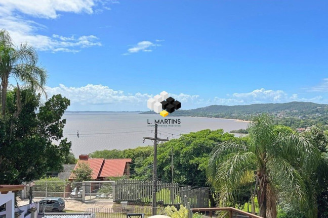 Imagem Casa com 3 Quartos à Venda, 395 m² em Espírito Santo - Porto Alegre Imagem Casa com 3 Quartos à Venda, 395 m² em Espírito Santo - Porto Alegre