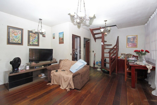 Imagem Casa com 4 Quartos à Venda, 300 m² em Glória - Porto Alegre Imagem Casa com 4 Quartos à Venda, 300 m² em Glória - Porto Alegre