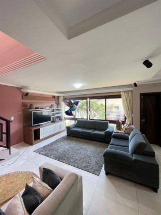 Imagem Casa com 4 Quartos à Venda, 240 m² em Centro - Torres Imagem Casa com 4 Quartos à Venda, 240 m² em Centro - Torres